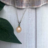 Pearl Pendant With Blue Topaz
